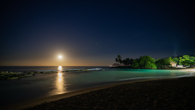 Full Moon setting at Paradise Cove