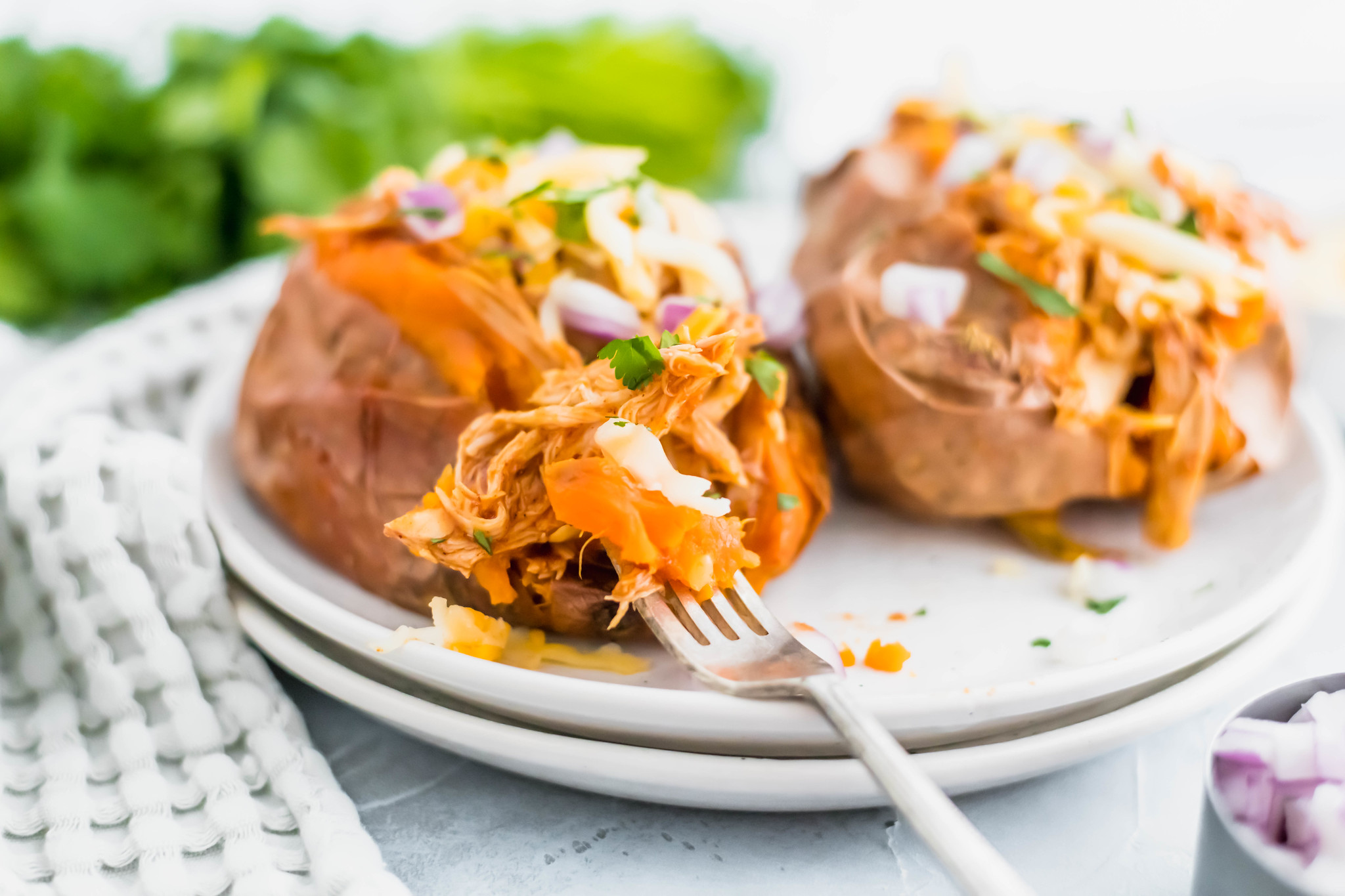 Eating healthy doesn't have to be boring. Especially with these BBQ Chicken Stuffed Sweet Potatoes around. Simple to prep and so yummy.
