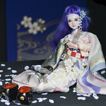 Haru in purple kimono with wisteria.