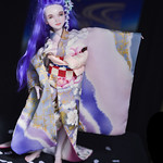 Haru in purple kimono with wisteria.