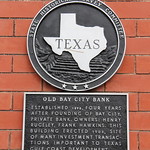 Old Bay City Bank (Bay City, Texas) Historical marker for the old Bay City Bank building in Bay City, Texas.  The plaque reads:

Established 1898, four years after founding of Bay City. Private bank. Owners: Henry Rugeley, Frank Hawkins. This building erected 1903, site of many investment transactions important to Texas Gulf Coast development. Recorded Texas Historic Landmark, 1965