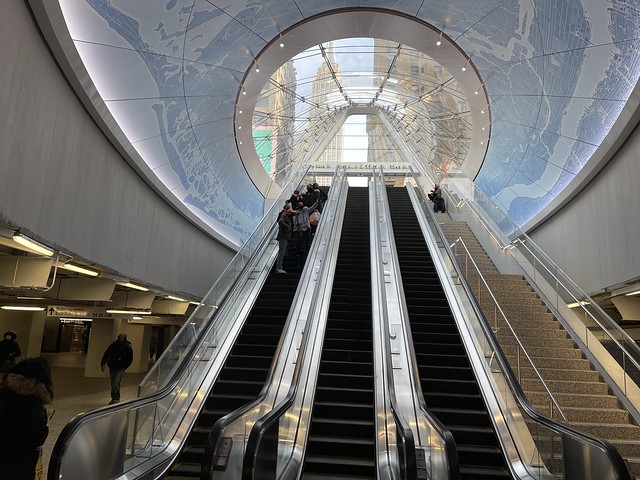Pennsylvania Station NYC escalator with views of the Empire State Building Moynihan Train Hall Penn Station MTA LIRR Long Island Rail Road Amtrak train station Grand Opening Day January 1, 2021