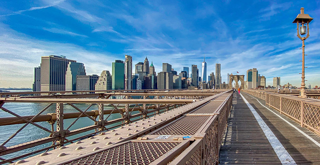 Manhattan skyline view from Brooklyn Bridge walkway