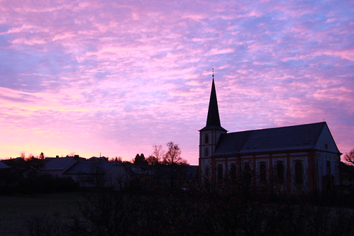 luxembourg junglinster church tower morning sunrise cold winter