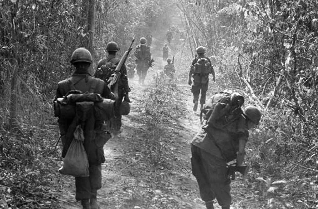 Vietnam War 1969 | U.S. Marines walk along a jungle road nea… | Flickr