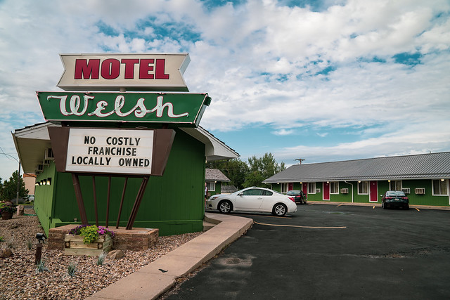 Wall, South Dakota - July 24, 2020: Sign and exterior of the Motel Welsh, a small, locally owned motorcourt style retro motel, near Wall Drug and the Badlands