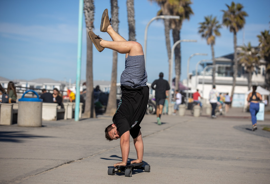Skateboard handstand