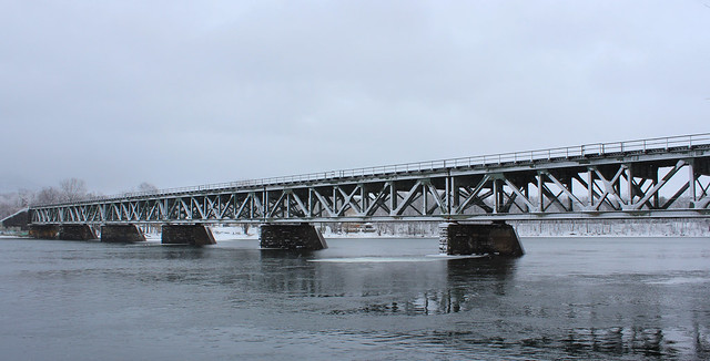 Railway bridge on a foggy winter day