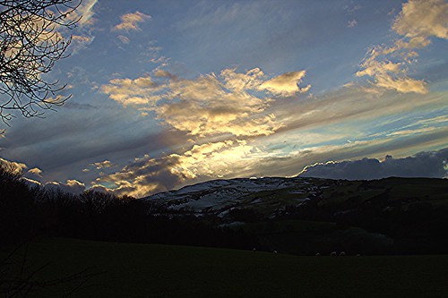 sunset betwsynrhos conwy northwales greatbritain uk unitedkingdom filickrnature canon canoneos1200d silhouettes trees mountains hillsides snow sheep welshcountryside welshlandscapes agriculture farming january2021