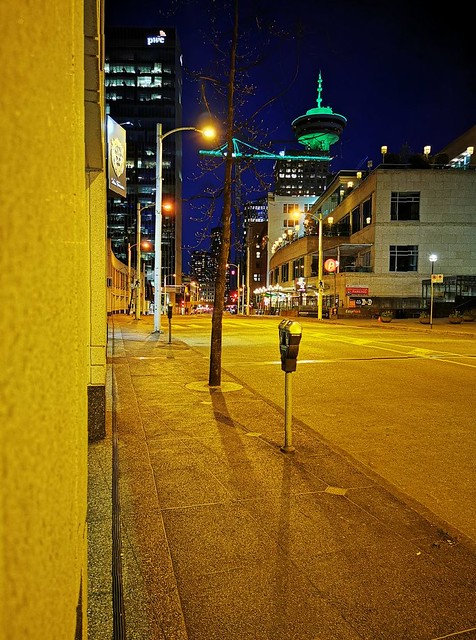 Harbour Centre dead ahead (slightly to starboard) in green.  West Hastings Street.  Vancouver, British Columbia, Canada.
