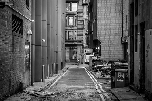 leanneboulton streetphoto alleyway camera urban street candid streetphotography candidstreetphotography streetlife urbanlandscape 1984 bigbrother alley woman female girl walking stride perspective depth cctv lines framing gritty grime backstreet tone texture detail naturallight outdoors city scene human life living humanity society culture lifestyle people canon canon5dmkiii 70mm ef2470mmf28liiusm black white blackwhite bw mono blackandwhite monochrome glasgow scotland uk