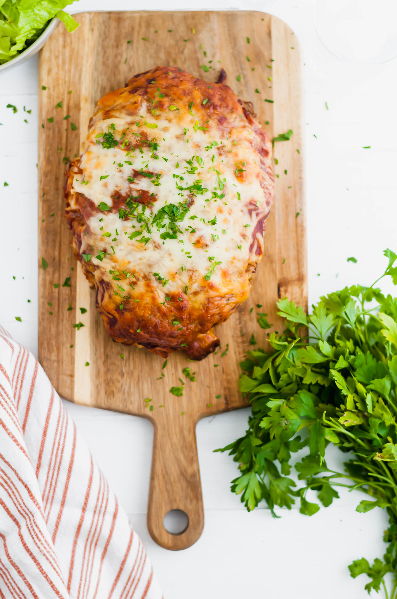 Two dinnertime favorite collide with this Pizza Meatloaf. Pizza ingredients throughout the meatloaf and on top puts that pizza flavor over the top.