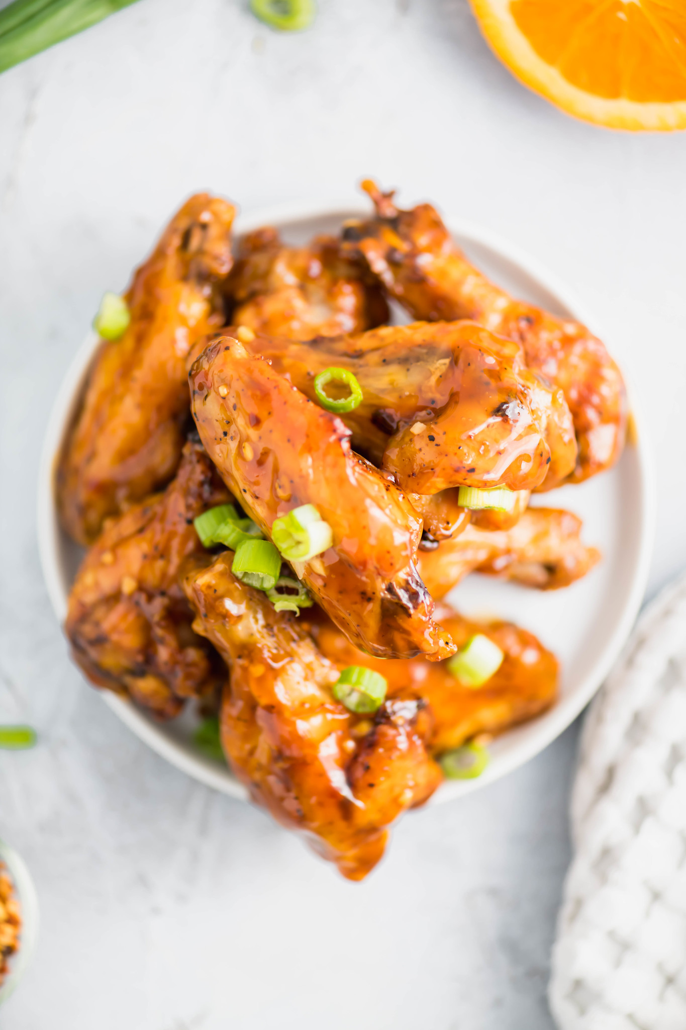 Need a fun and flavorful chicken wing recipe for the Super Bowl? These Orange Chicken Wings are packed with bright, spicy flavor.