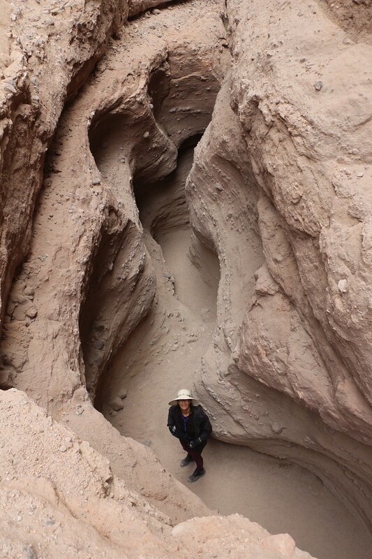 Vicki down below in the slot canyon section of Ladder Canyon after descending a ladder