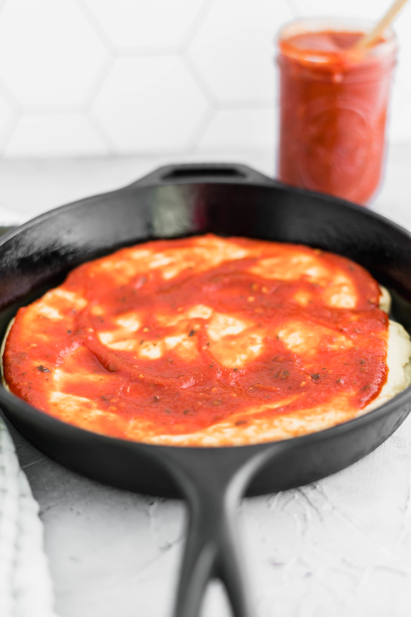 Movie night just got a whole lot better with this Cast Iron Skillet Pizza. It has the perfect crispy bottom and is topped with your favorite pizza toppings.