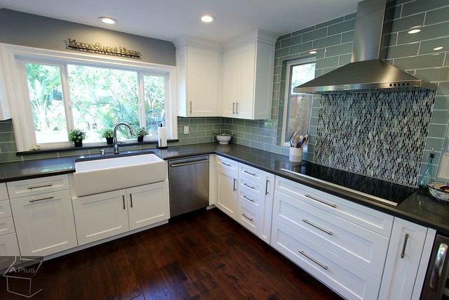 White Cabinets Kitchen Remodel Quartz countertop neutral color backsplash tile in Trabuco Canyon, Orange County https://www.aplushomeimprovements.com/portfolio_page/transitional_style_white_kitchen_remodel_in_trabuco_canyon_orange_county84/