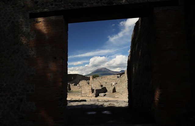 Through the ruin doorway, Vesuvio beckons
