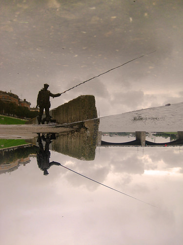 tver fishman monument volga embarkment reflection