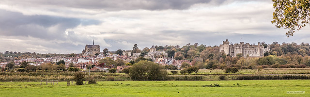 Panorama of the town of Arundel and Arundel Castle across the flood-plain of the River Arun.