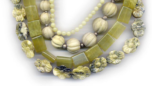 a collection of yellow-green beads in Serpentine, Olive Jade, Yellow Turquoise