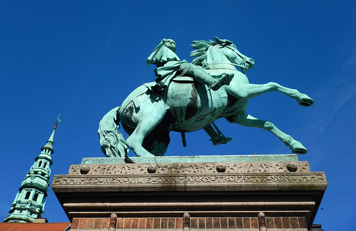 Verdigris copper statue of a knight on a horse in Copenhagen, Denmark