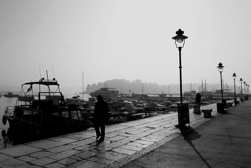 winter sun by the sea by christikren, blackandwhite bw christikren candid boats black croatia human lantern monochrome mood istrien man no