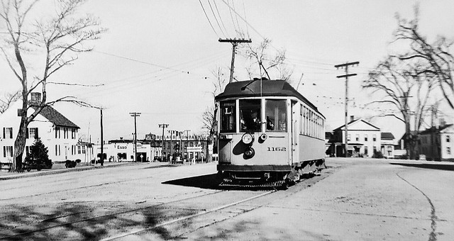 Connecticut Company Hartford Division street car (Wason, double truck, closed, built 1907) # 1162, is seen while operating on a city street and is traveling on Route 
