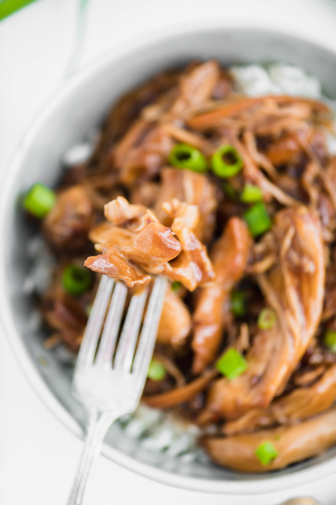 Slow Cooker Bourbon Chicken is just what your busy weeknights need. Packed full of sweet, sticky, rich flavor.