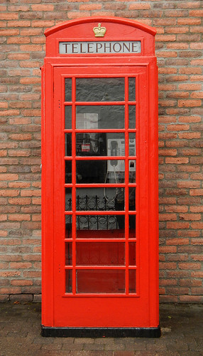 A classic royal red British phone booth