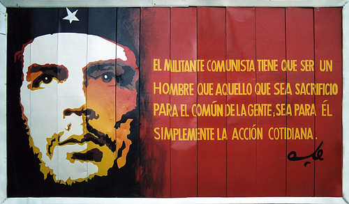 Red and yellow billboard featuring the words of Che Guevara in Havana, Cuba