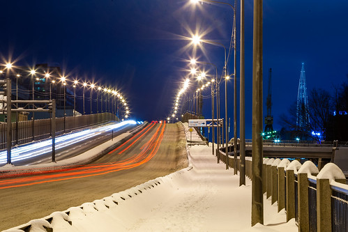 road night building architecture lights sky snow trees city