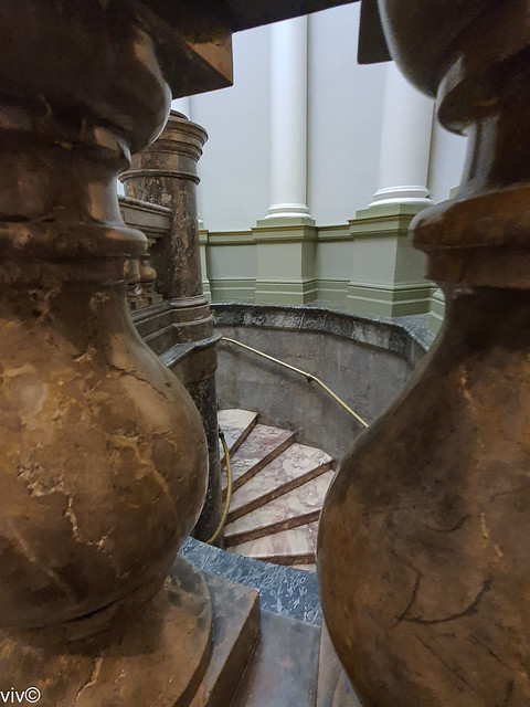 Lovely framing by balustrade of curved stairway at historic Art Gallery of New South Wales, Sydney, New South Wales, Australia