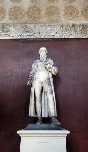 A statue of Gutenberg, the inventor of the printing press which brought books and their contained knowledge to the people