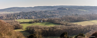 A sunny, spring-like day in late February. The village of Westcott and Leith Hill from the North Downs near to Ranmore Common, Surrey.