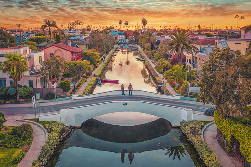 venice beach california canals losangeles canal ca historic district abbotkenney waterway sunset sky water ocean clouds reflections palmtrees boats teal orange colors colorful painterly