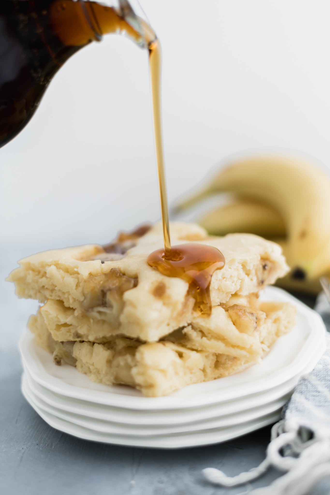 Get your pancakes made in a flash with this fun method. Sheet Pan Pancakes with Caramelized Bananas will quickly become a breakfast favorite. A perfect freezer friendly breakfast.