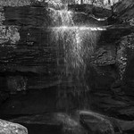 Burden Falls without the color Burden Falls is within Shawnee National Forest in Southern Illinois.  This is a great quick stop as it is located right off a parking area with little to no hiking required depending on where you’d like to view it from.  Located within the Garden of the Gods Recreation Area, the waterfall is a half hour drive East of where route 24 meets route 57, just south of Marion, Illinois.