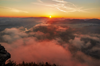 Misty sunrise on Lilienstein mountain