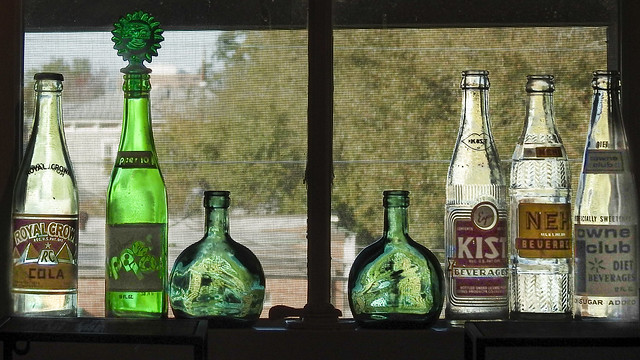 vintage soda / pop / cokes / bottles
