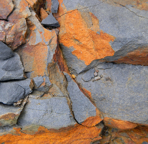 Rock formations of rust and shale in Porthgain, Wales