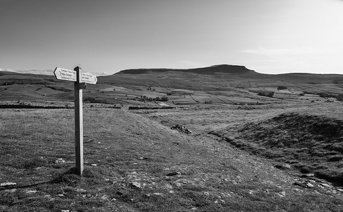 landscape yorkshire northyorkshire yorkshiredales wharfedale hortoninribblesdale threepeaks penyghent limestone signpost blackwhite monochrome