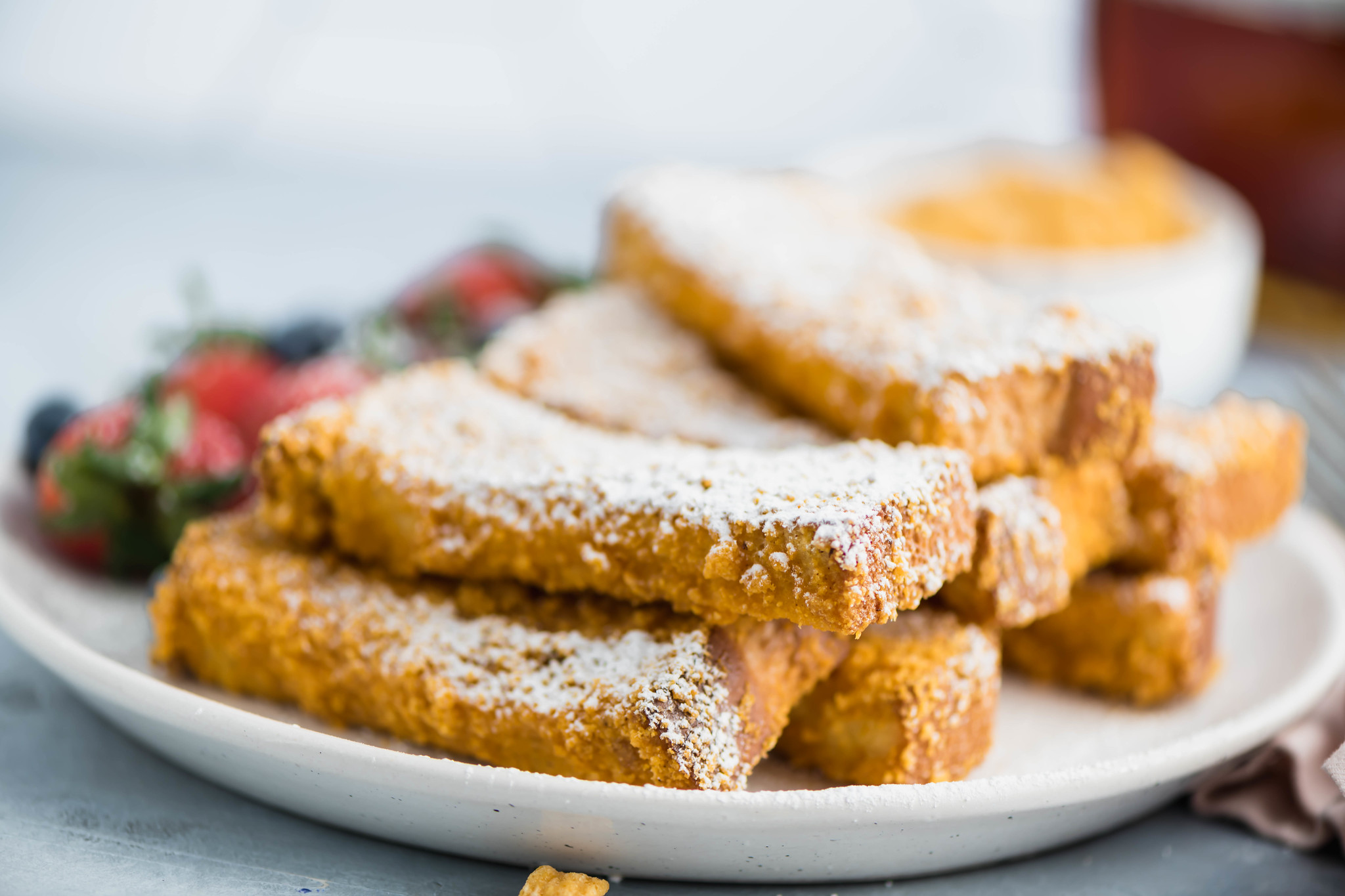 These Crunchy French Toast Sticks are sure to become a family favorite. Thick cut bread cut into sticks and coated in your favorite cereal crumbs.