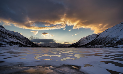 landscape sunset snow ice fjord frozen mountains tromsø
