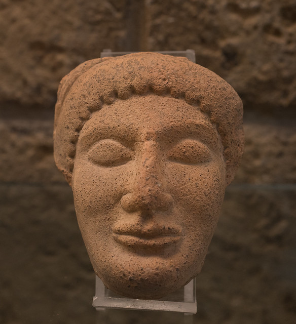 Etruscan terracotta female-head antefix from San Giuliano