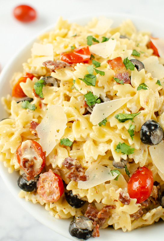 Caesar Pasta salad with bacon, tomatoes, and black olives
