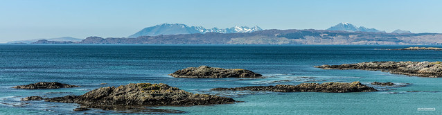 Sleat Peninsula, Cuillins of Skye, from the skerries and beaches of the Arisaig/Morar coast on a warm spring day.