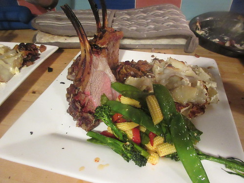 Bejewelled stuffed crown of lamb with Domino Dauphinoise and sweet chilli stir fry.