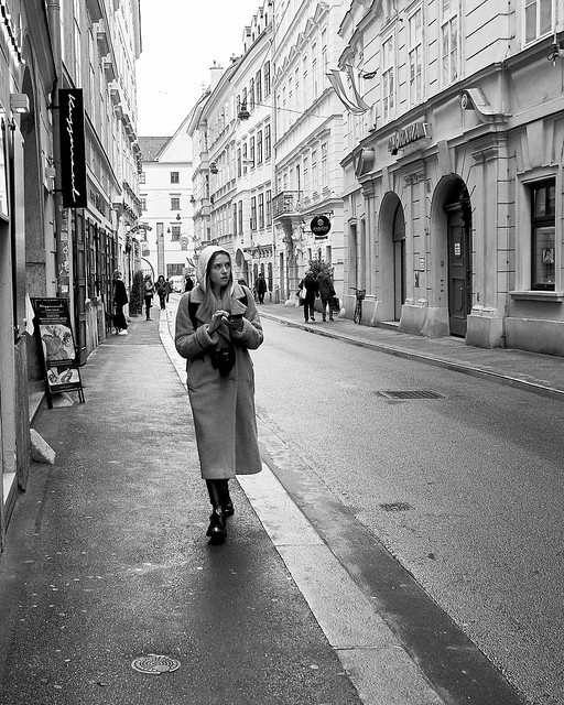 A young girl with a camera near St. Stephen's Cathedral