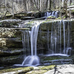 Burden Falls Waterfall Burden Falls is within Shawnee National Forest in Southern Illinois.  This is a great quick stop as it is located right off a parking area with little to no hiking required depending on where you’d like to view it from.  Located within the Garden of the Gods Recreation Area, the waterfall is a half hour drive East of where route 24 meets route 57, just south of Marion, Illinois.