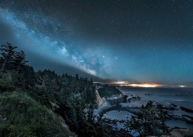 The Milky Way, meteors and the planet Jupiter over Cape Arago State Park, Oregon Coast